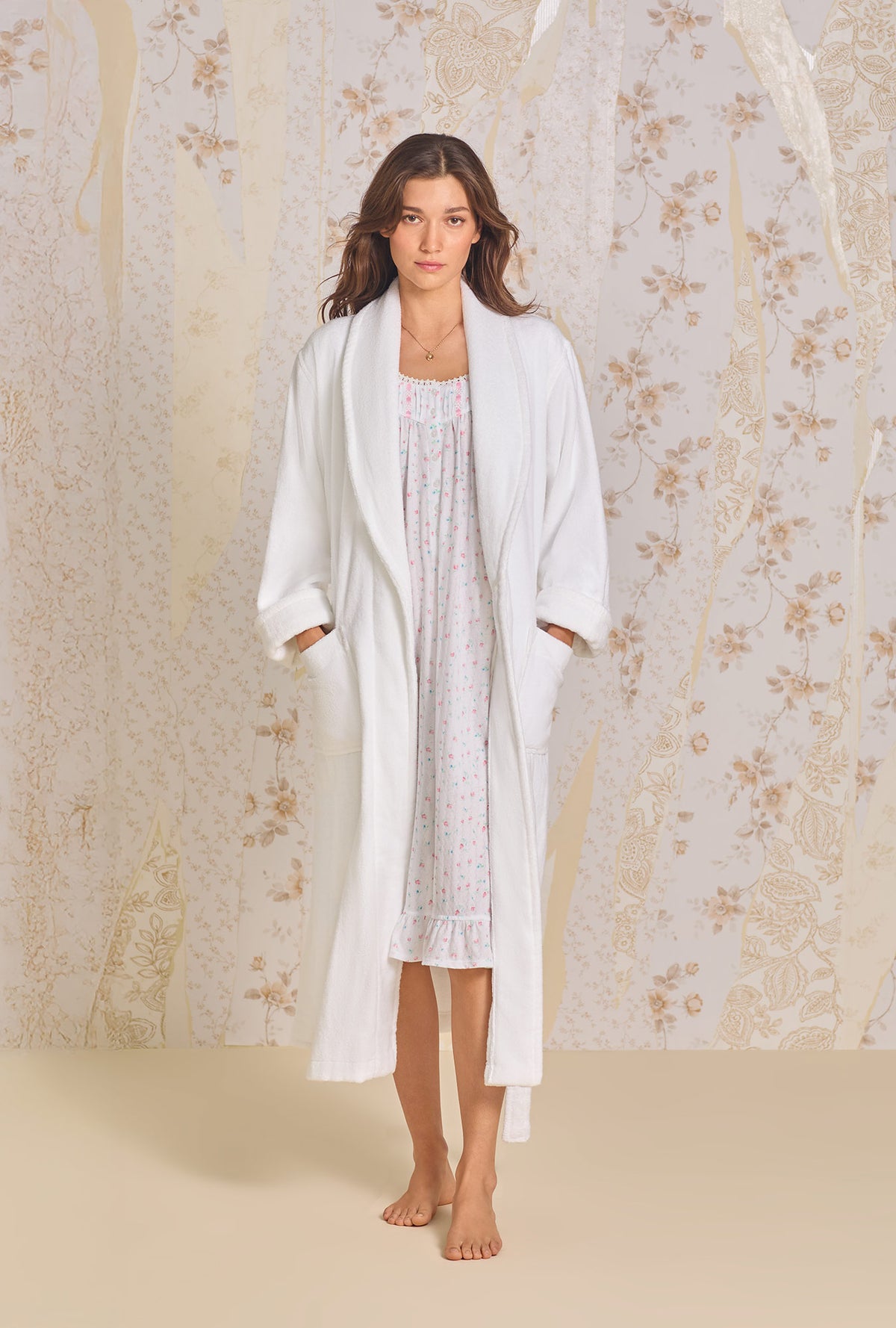 A lady wearing Iconic White Cotton Terry Wrap Robe