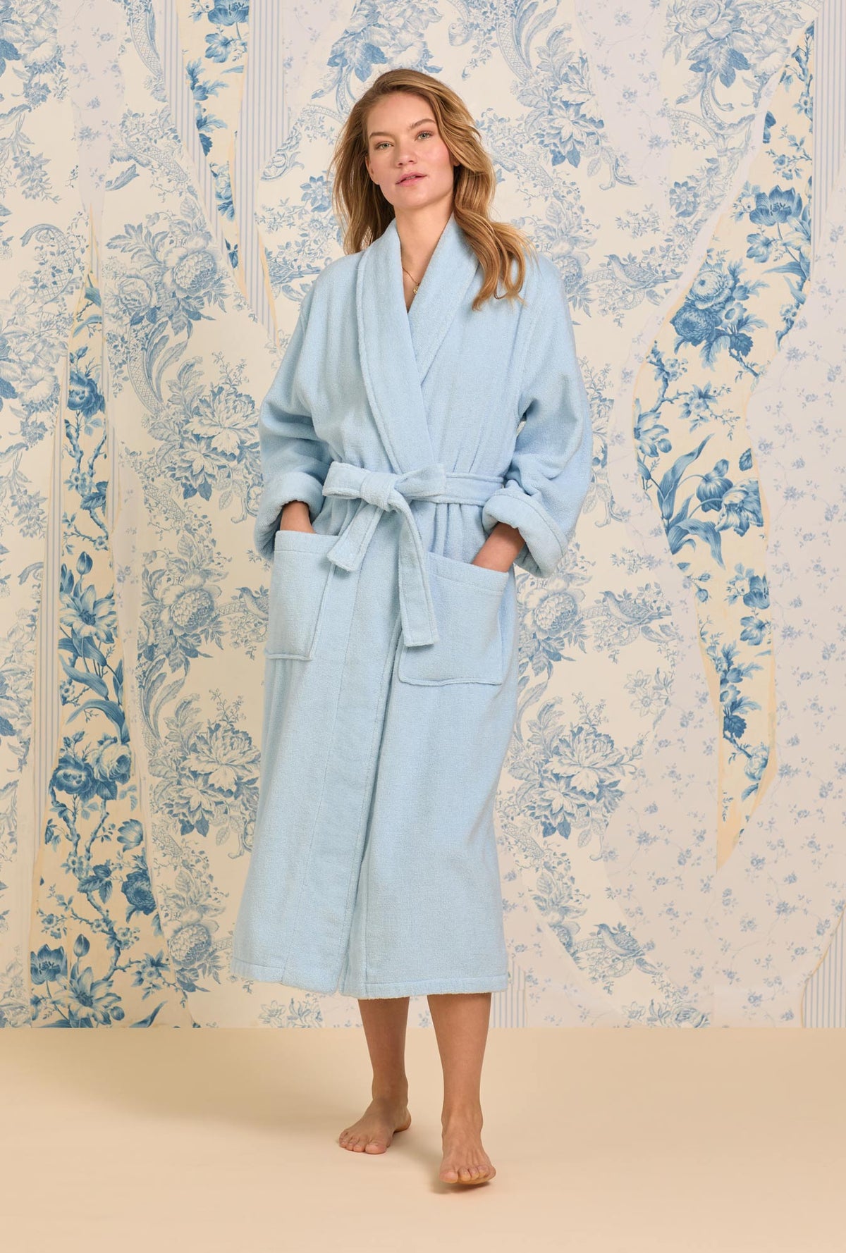 A lady wearing French Blue Cotton Terry Wrap Robe