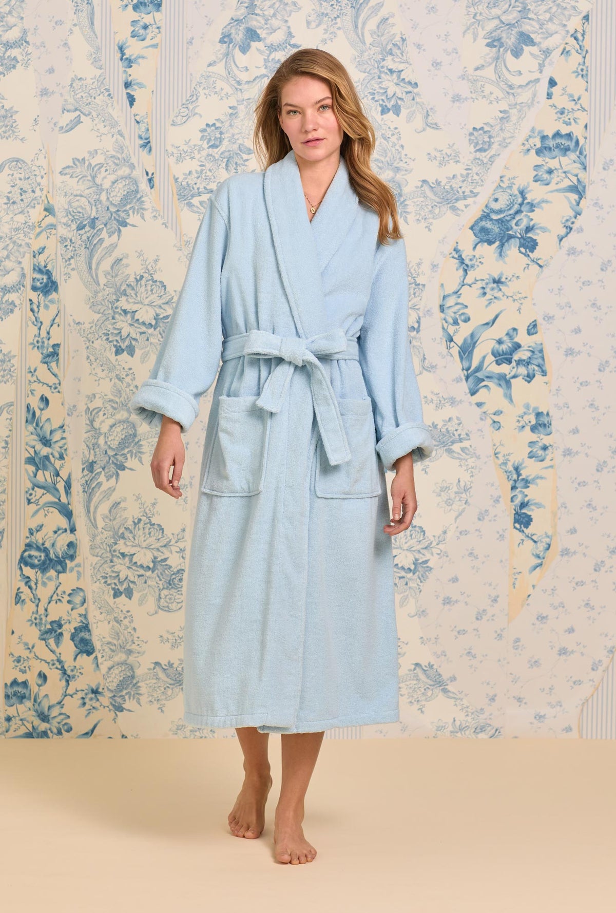 A lady wearing French Blue Cotton Terry Wrap Robe