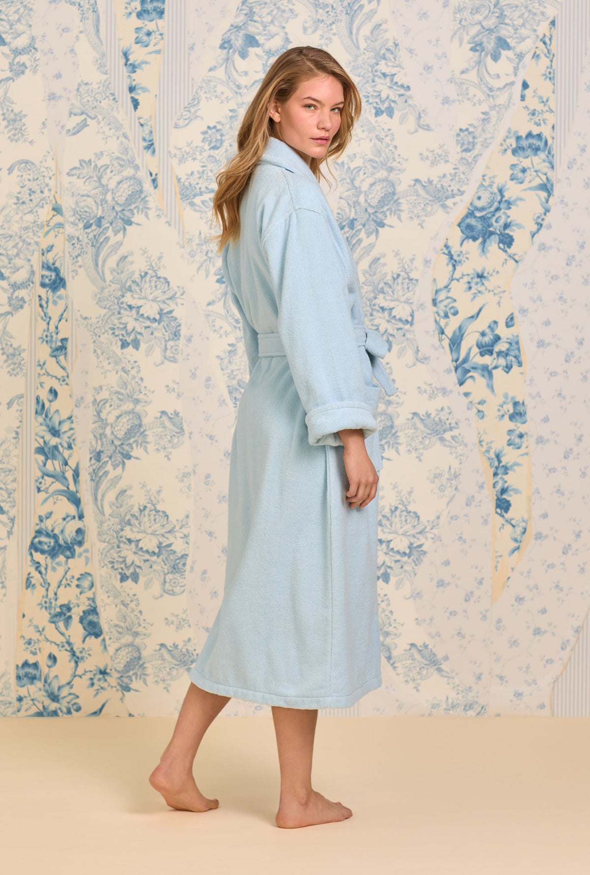 A lady wearing French Blue Cotton Terry Wrap Robe