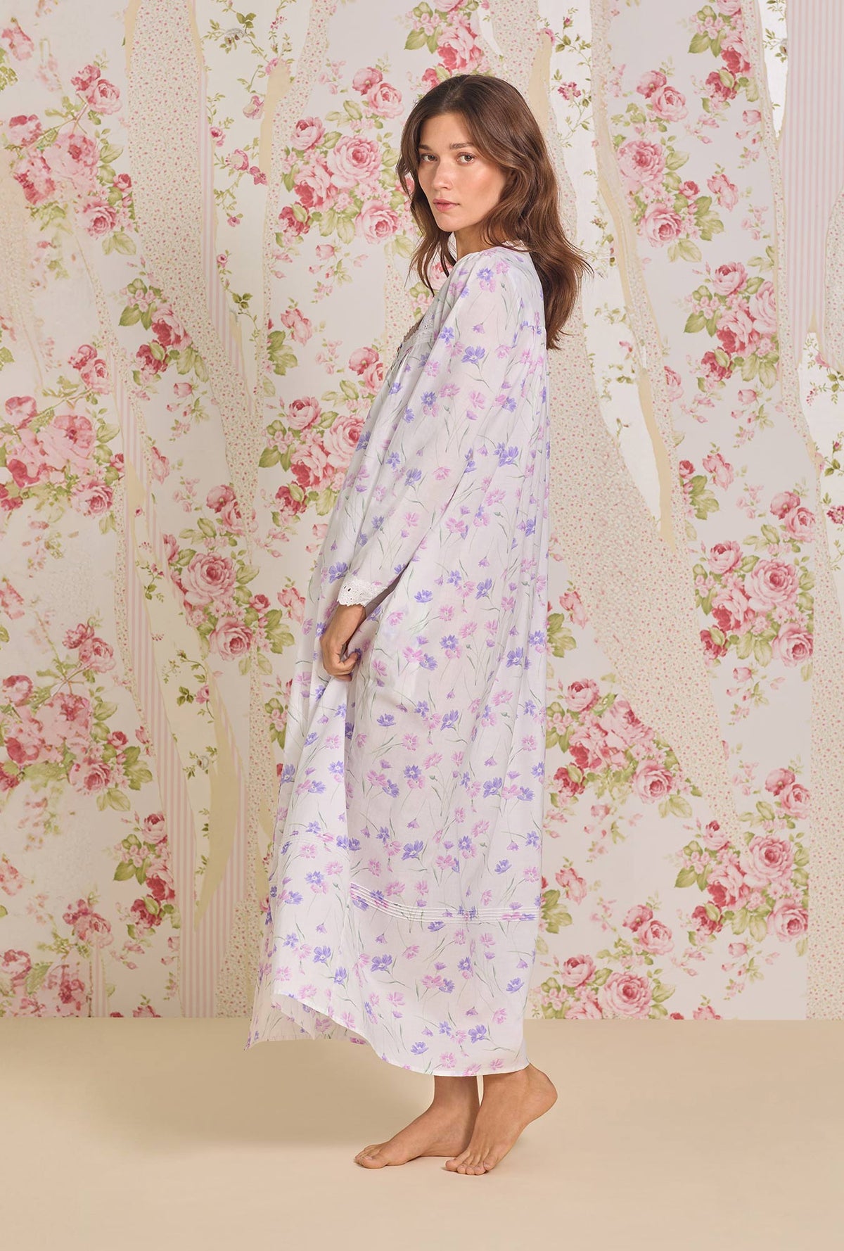 A lady wearing Royal Daisy Cotton Lawn Button Front Robe