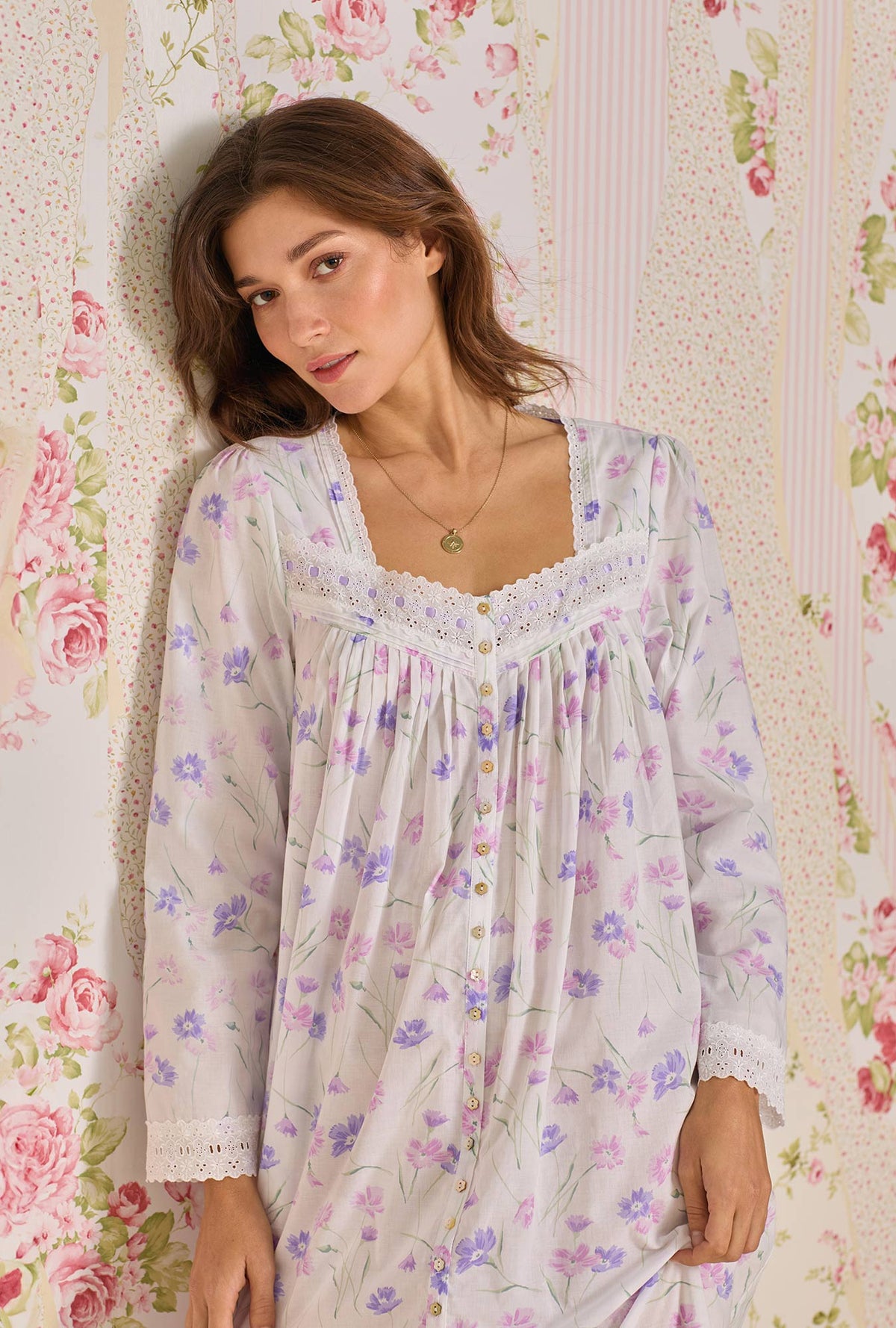 A lady wearing Royal Daisy Cotton Lawn Button Front Robe