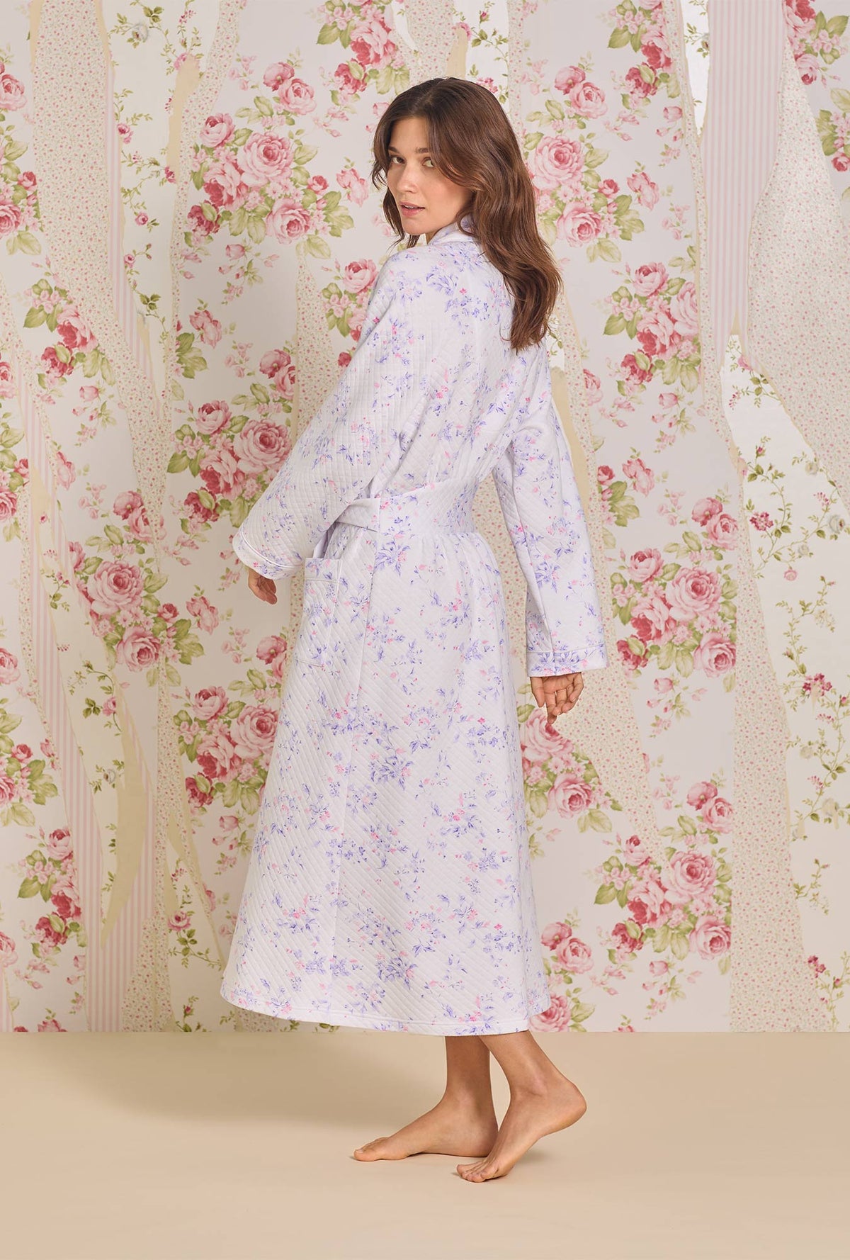 A lady wearing Petite Floral Diamond Quilt Wrap Robe