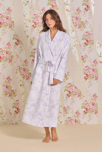 A lady wearing Petite Floral Diamond Quilt Wrap Robe