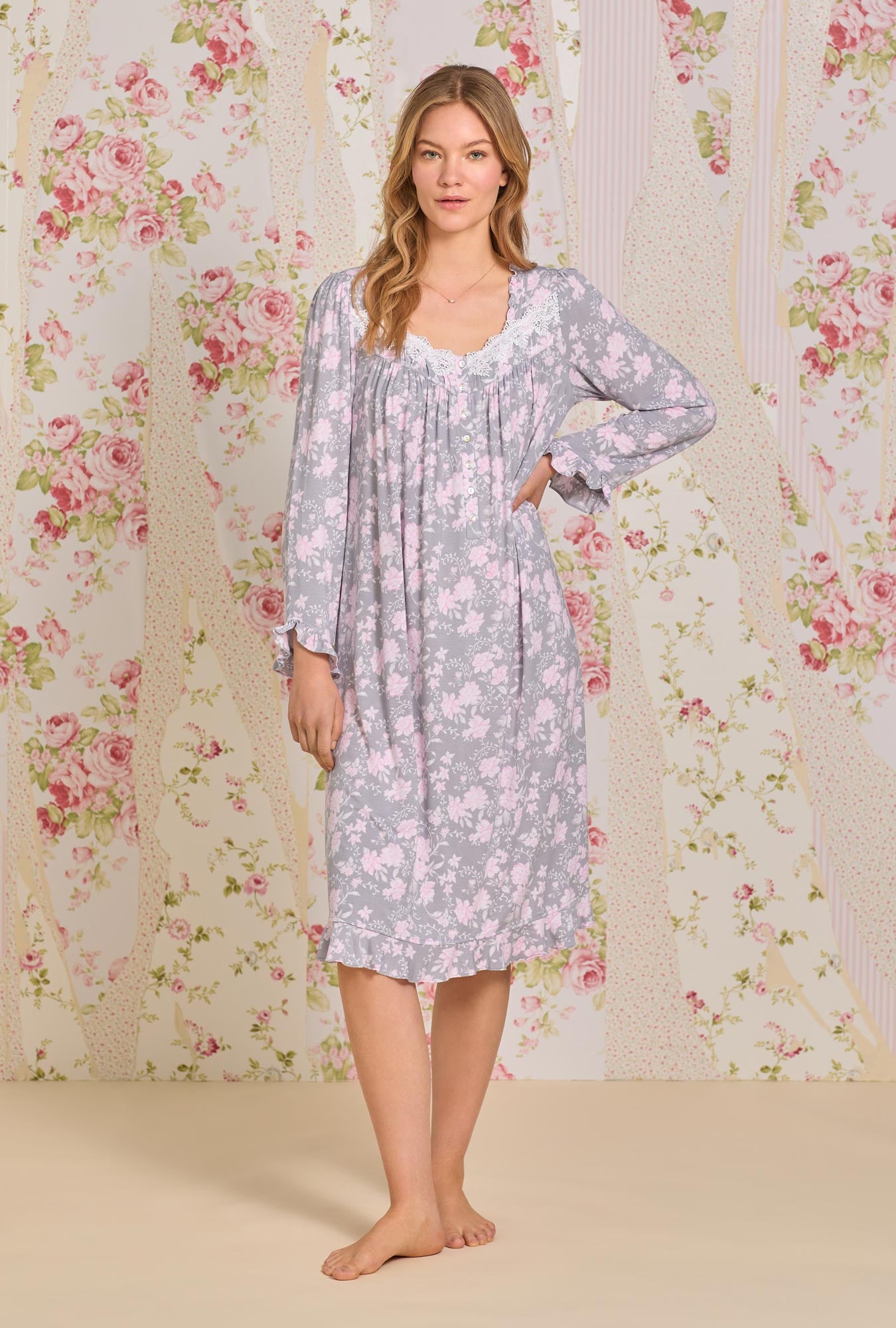 A lady wearing long sleeve waltz knit nightgown with water roses print