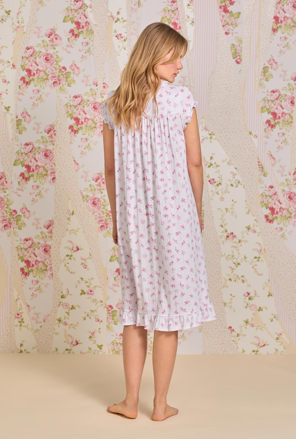 A lady wearing Dreamy Rose Pointelle Waltz Cap Sleeve Nightgown