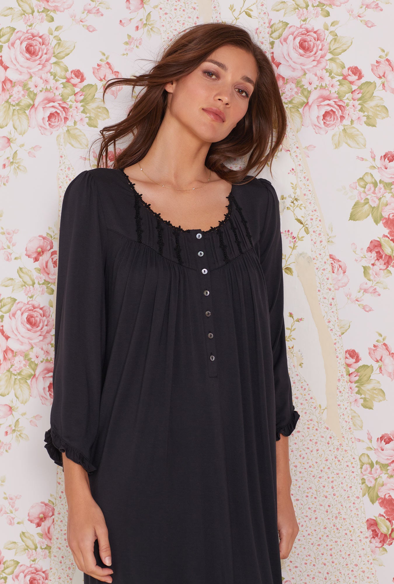 A lady wearing Iconic Black Tencel™ Modal Long Sleeve Waltz Nightgown