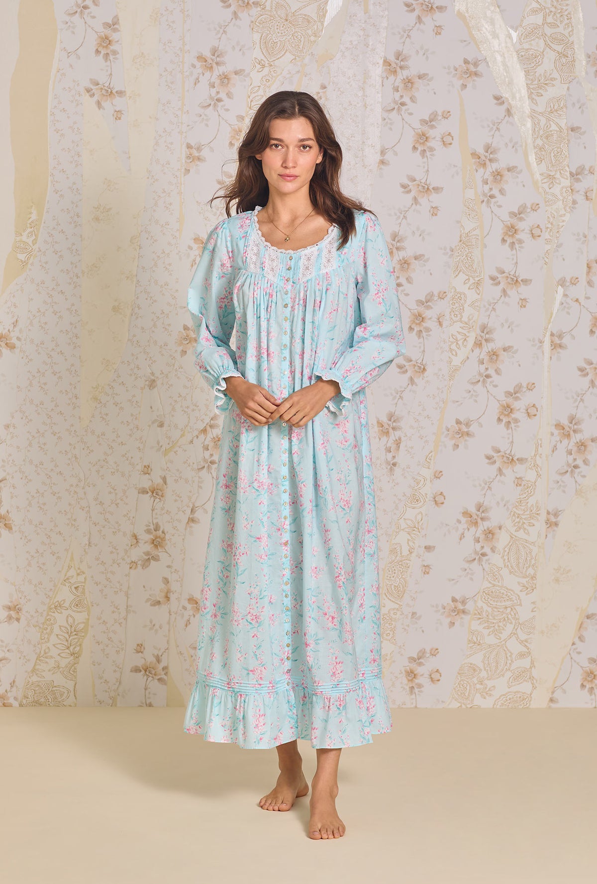 A lady wearing Candy Floral Long Sleeve Button Front Robe