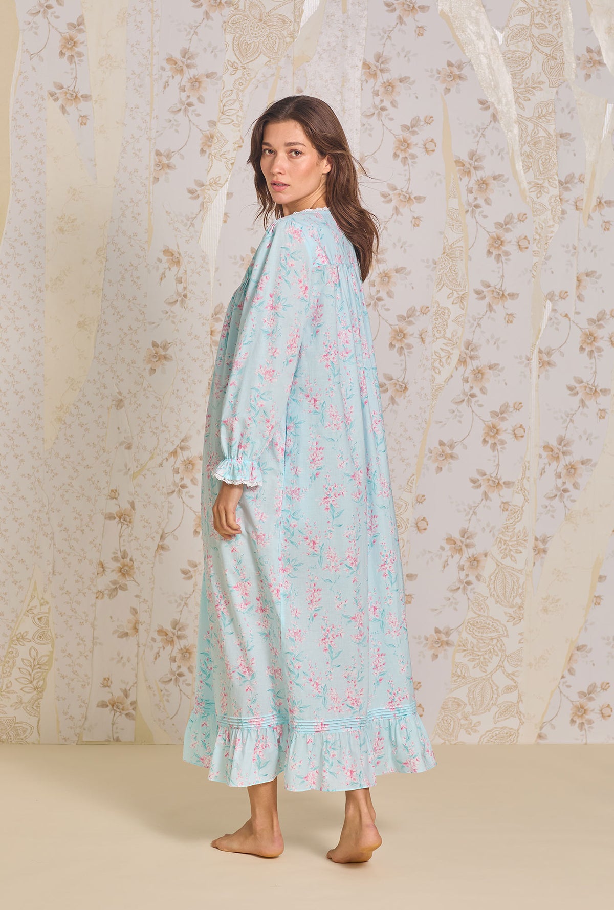 A lady wearing Candy Floral Long Sleeve Button Front Robe