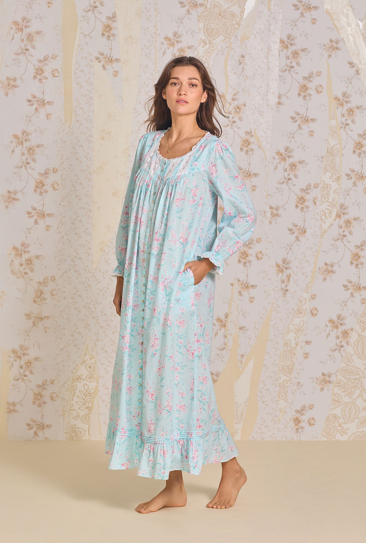 A lady wearing Candy Floral Long Sleeve Button Front Robe