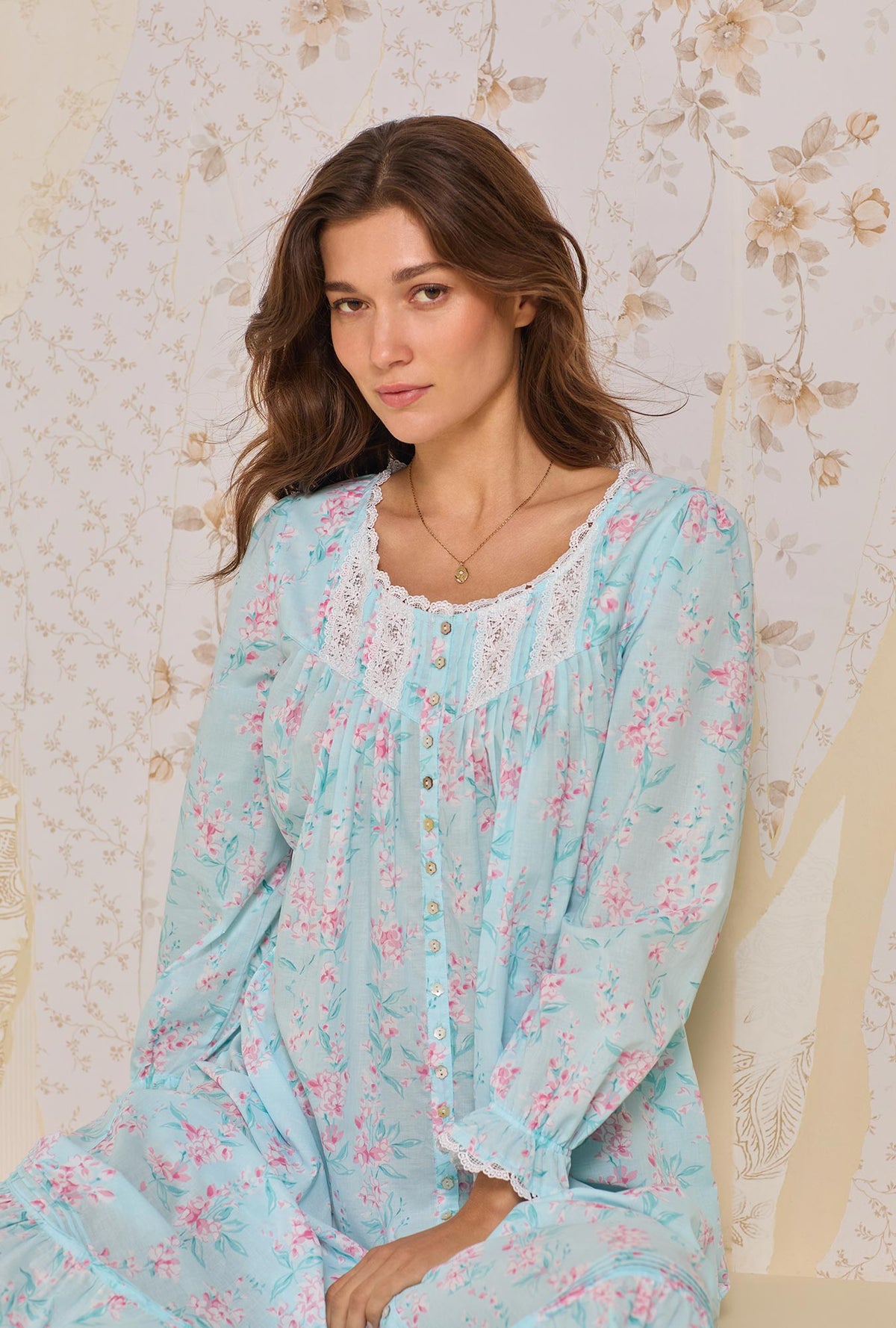 A lady wearing Candy Floral Long Sleeve Button Front Robe