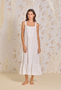 A lady wearing Iconic White "Julia" Cotton Lawn  Strappy Nightgown