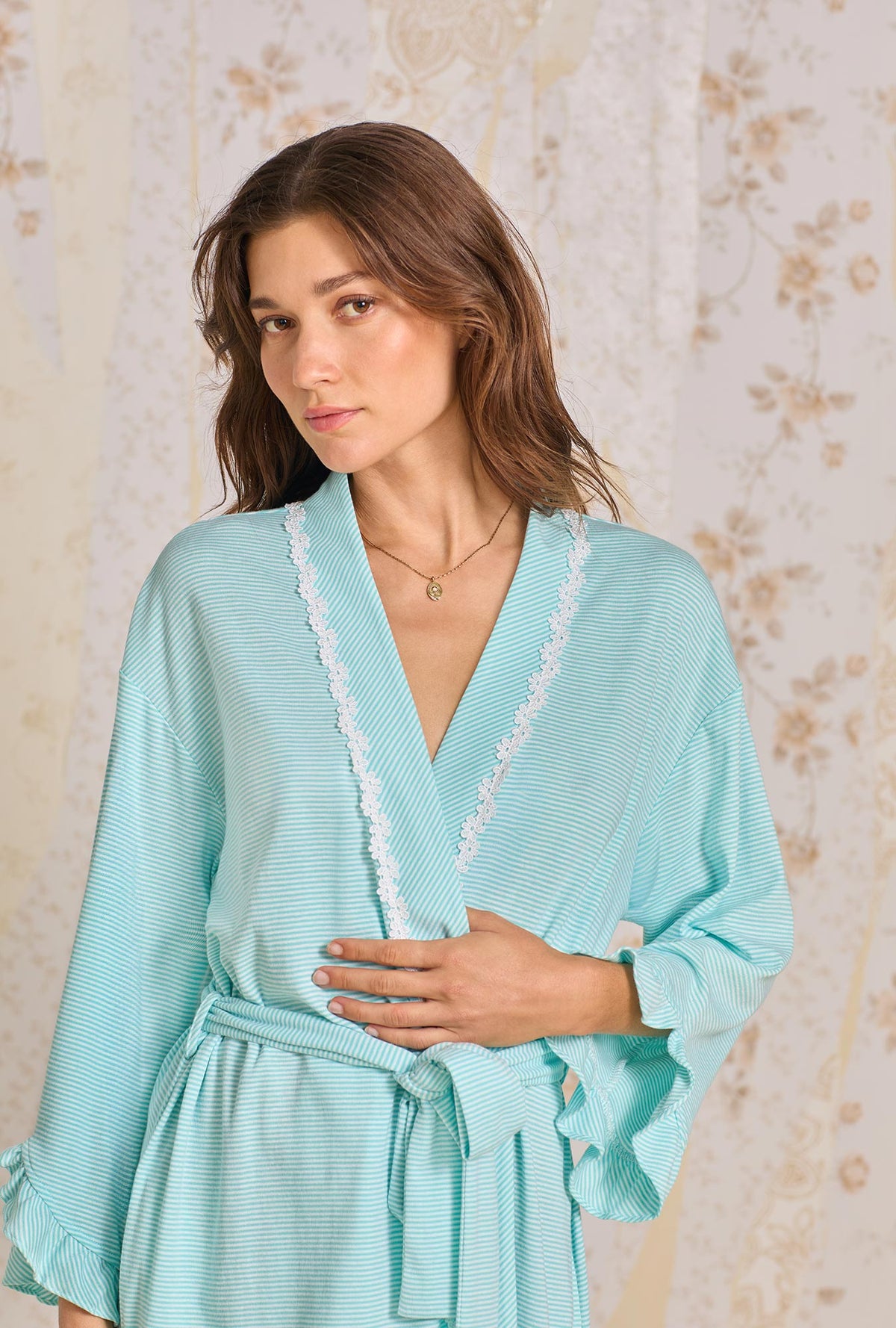 A lady wearing Aqua Stripe Cotton Rich Yarndye Short Wrap Robe