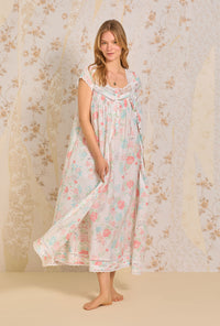 A lady wearing Summer Jubilee  Cotton Woven Cap Sleeve Button Front Robe