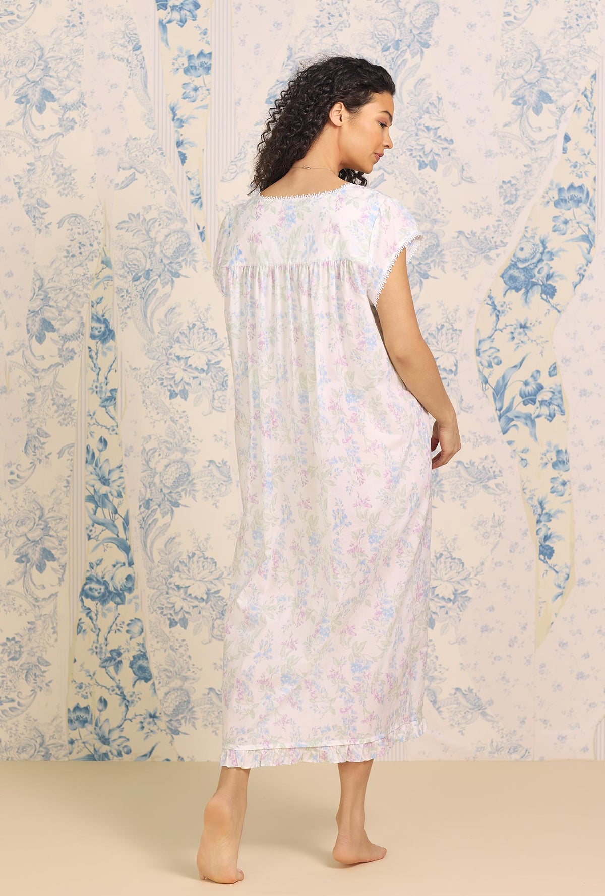 A lady wearing Lupine Garden Cap Sleeve Nightgown